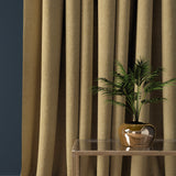 Curtain in a ochre herringbone wool fabric
