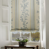 Blind in a printed linen fabric with grey and white stripes and an oak-leaf motif.