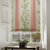 Blind in a  printed linen fabric with pink and green stripes and an oak-leaf motif.