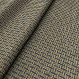 Printed linen fabric with textural weave pattern in brown and blue colours for upholstery.