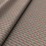 Printed linen fabric with textural weave pattern in pink and green colours for upholstery.