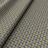 Printed linen fabric with textural weave pattern in brown and blue colours for upholstery.