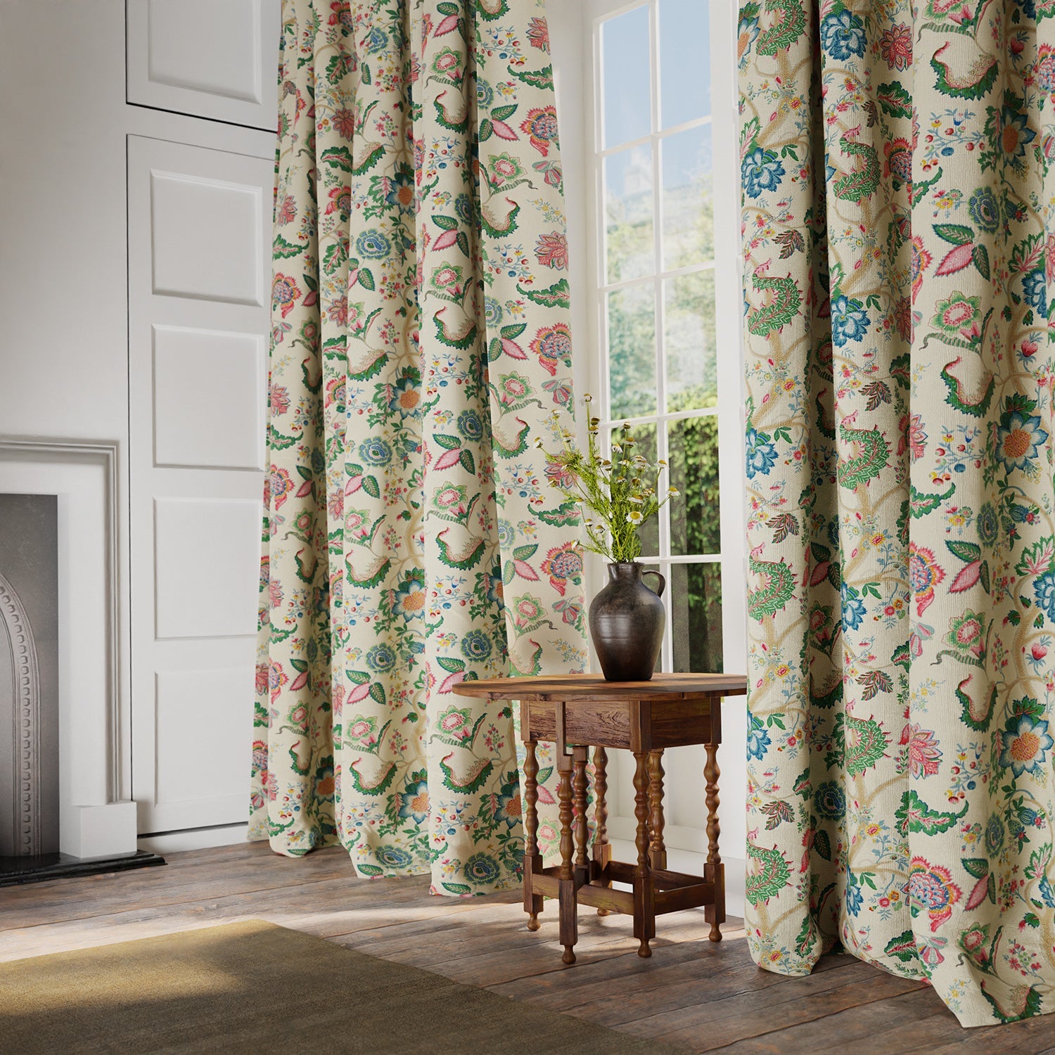 Curtains in a printed linen fabric with tree of life design in multicolours.