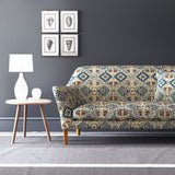 Velvet sofa upholstered in a printed velvet fabric with an oriental geometric design in blue colours