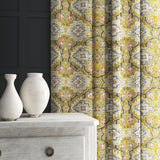 Velvet curtain in a printed velvet fabric with an oriental geometric design in yellow colours