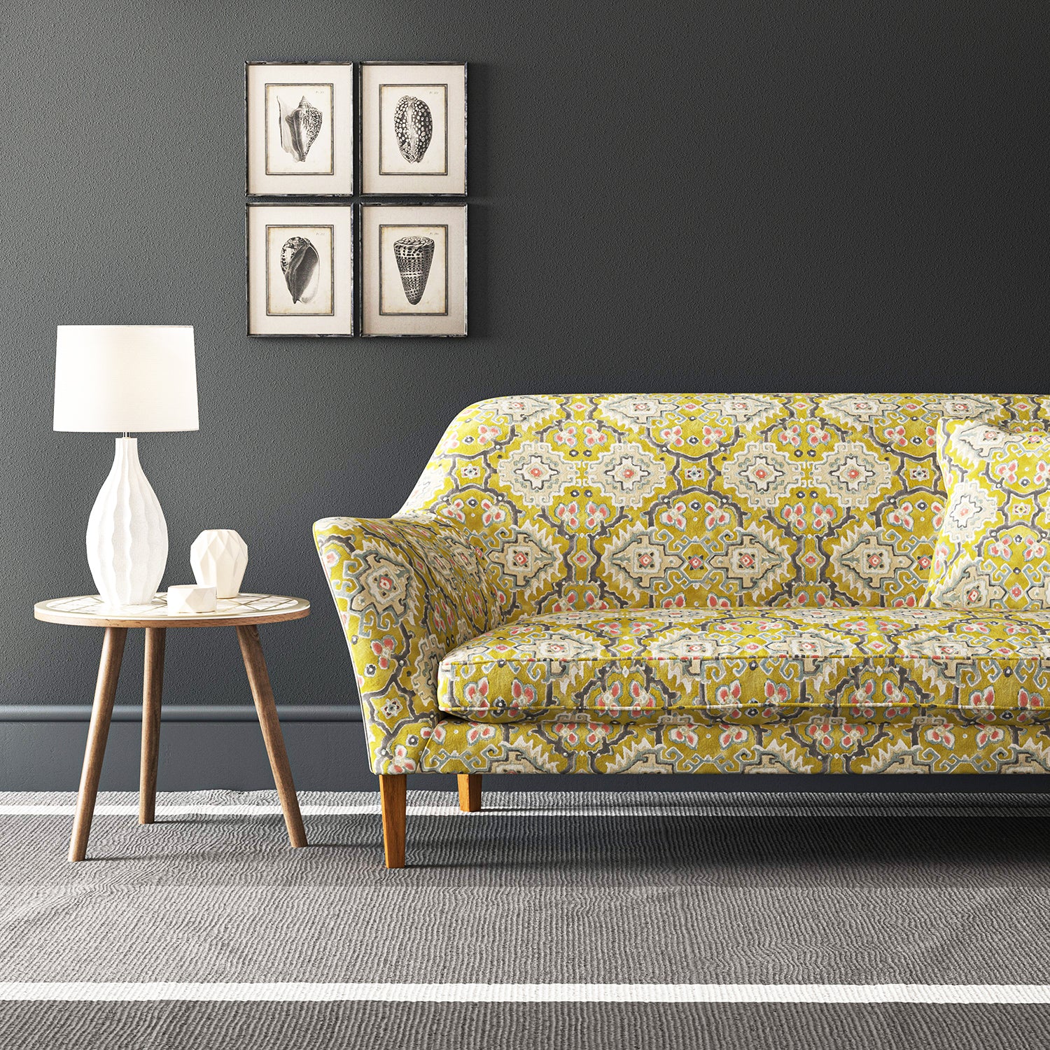 Velvet sofa upholstered in a printed velvet fabric with an oriental geometric design in yellow colours