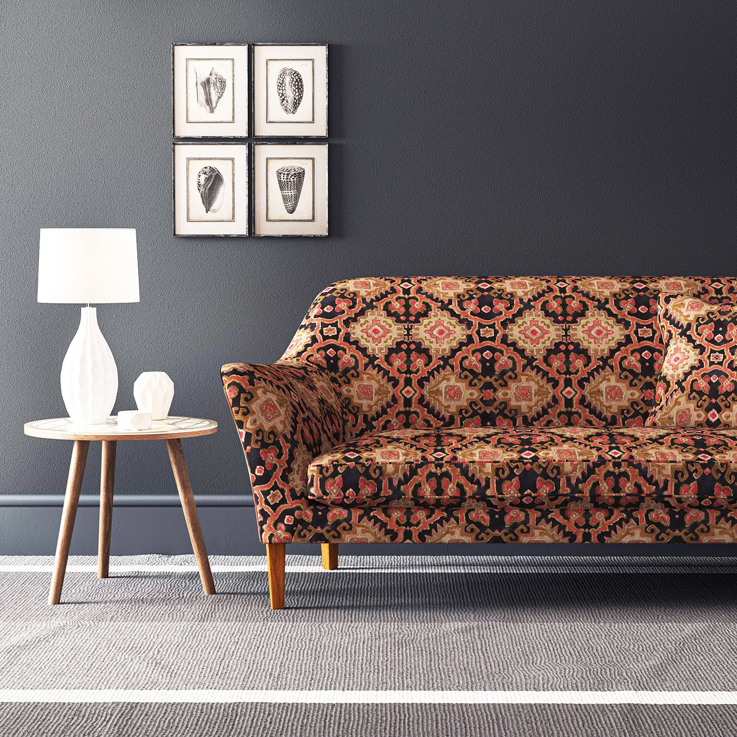 Velvet sofa upholstered in a printed velvet fabric with an oriental geometric design in multicolours