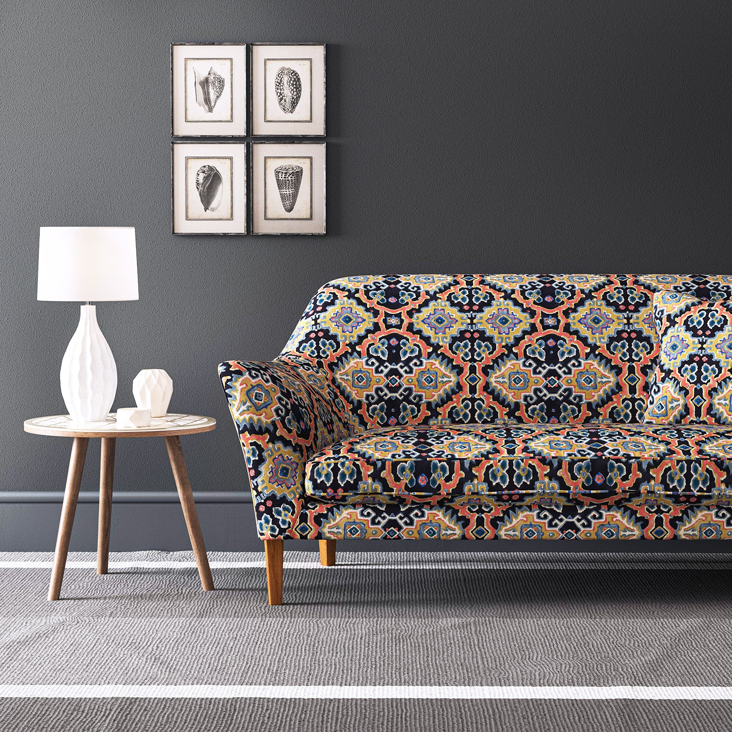 Velvet sofa upholstered in a printed velvet fabric with an oriental geometric design in multicolours