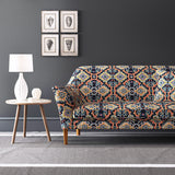 Velvet sofa upholstered in a printed velvet fabric with an oriental geometric design in multicolours
