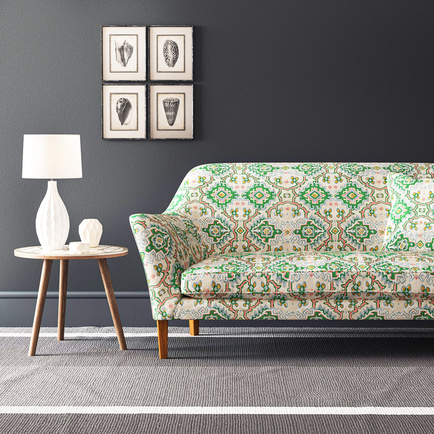 Velvet sofa upholstered in a printed velvet fabric with an oriental geometric design in multicolours