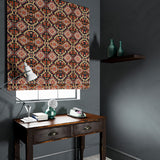 Velvet blind upholstered in a printed velvet fabric with an oriental geometric design in multicolours