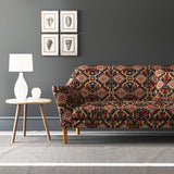 Velvet sofa upholstered in a printed velvet fabric with an oriental geometric design in muticolours