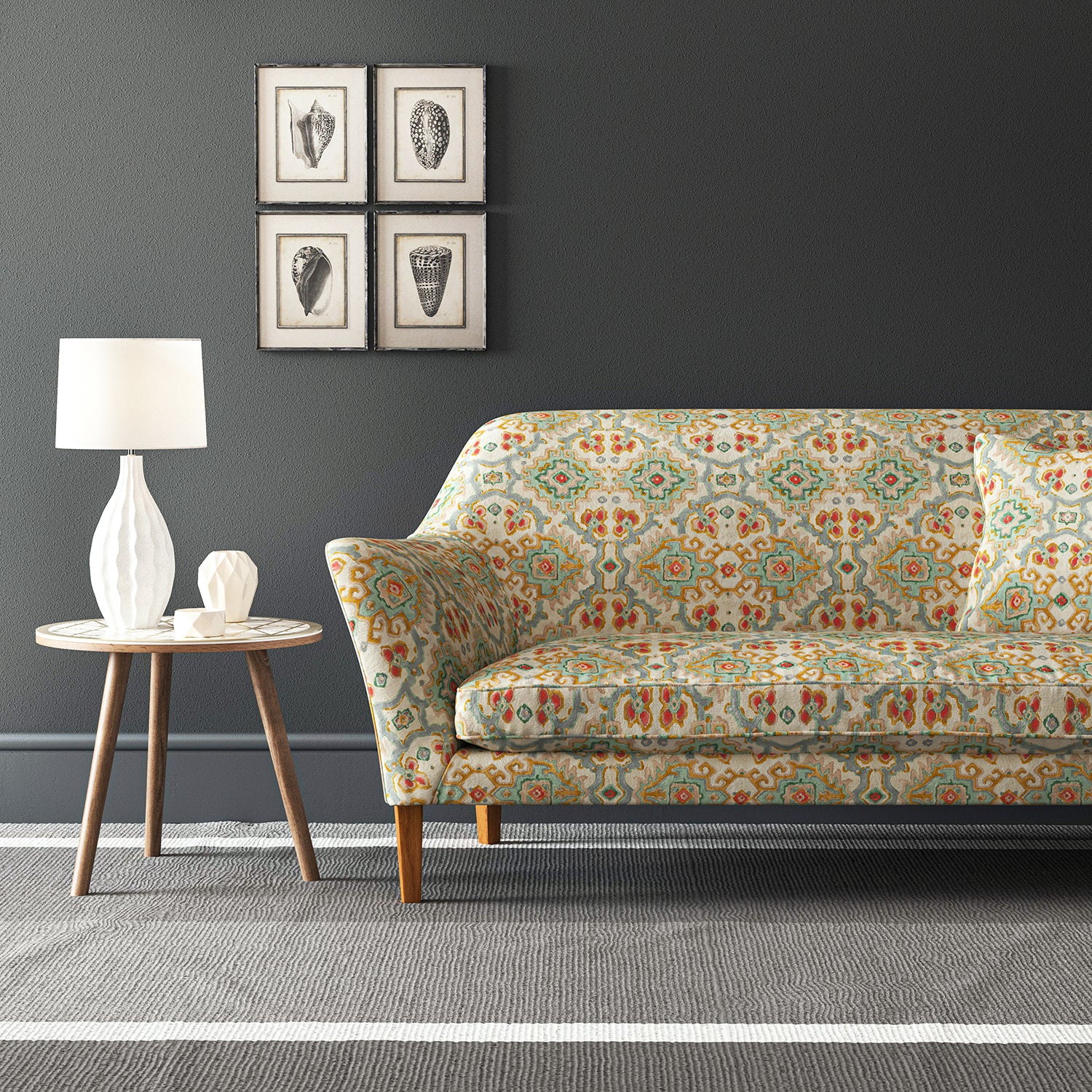 Velvet sofa upholstered in a printed velvet fabric with an oriental geometric design in multicolours
