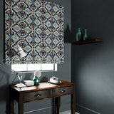 Velvet blind upholstered in a printed velvet fabric with an oriental geometric design in blue colours