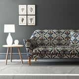 Velvet sofa upholstered in a printed velvet fabric with an oriental geometric design in blue colours