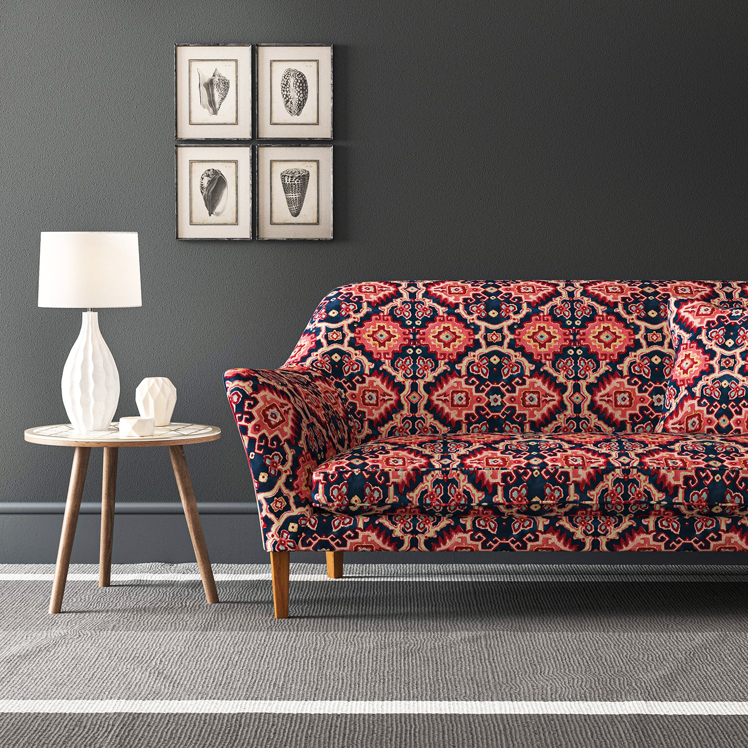 Velvet sofa upholstered in a printed velvet fabric with an oriental geometric design in pink and purple colours