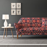Velvet sofa upholstered in a printed velvet fabric with an oriental geometric design in pink and purple colours