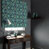 Velvet blind upholstered in a printed velvet fabric with an oriental geometric design in blue and green colours