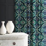 Velvet curtain in a printed velvet fabric with an oriental geometric design in blue and green colours