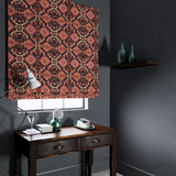 Velvet blind upholstered in a printed velvet fabric with an oriental geometric design in red colours