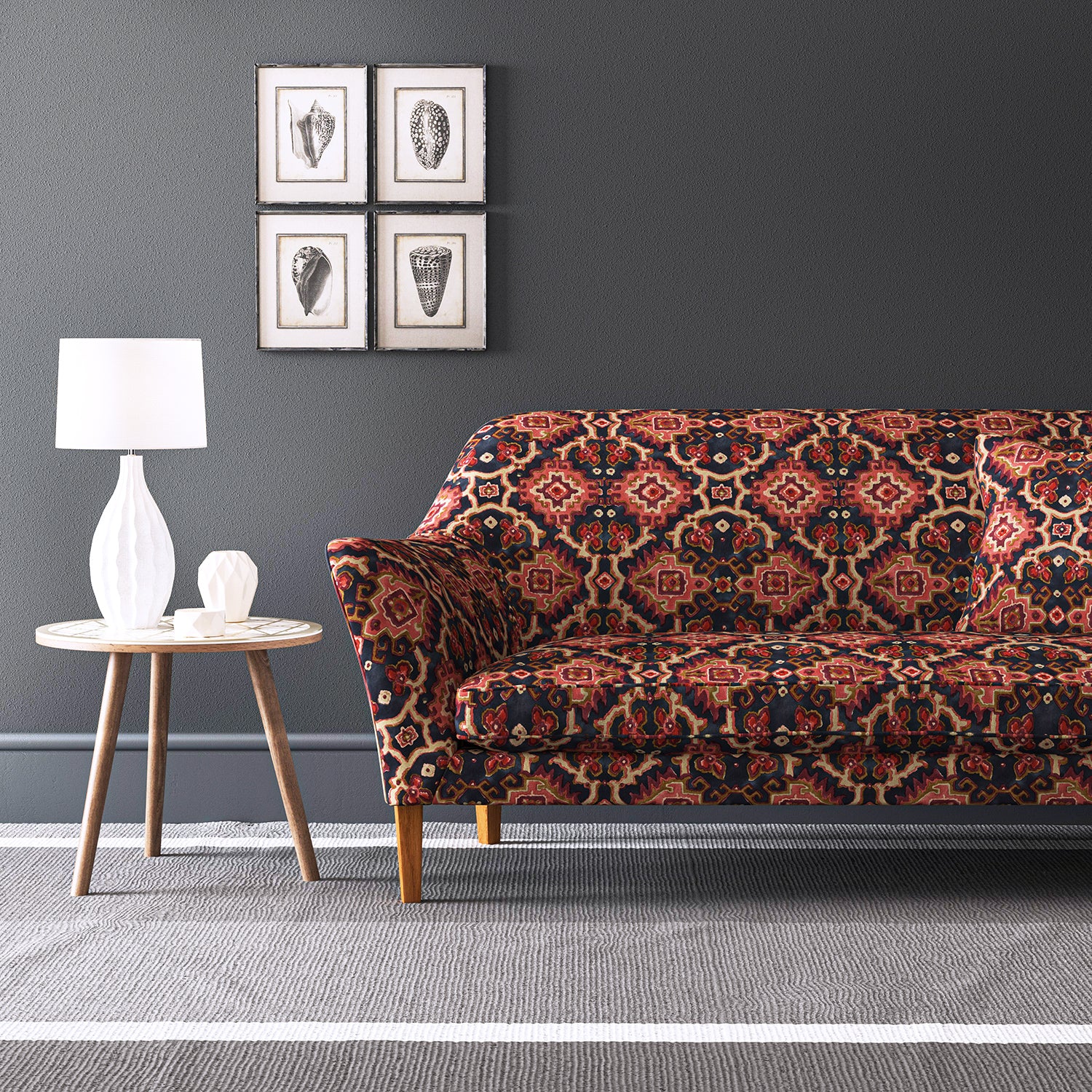 Velvet sofa upholstered in a printed velvet fabric with an oriental geometric design in red colours
