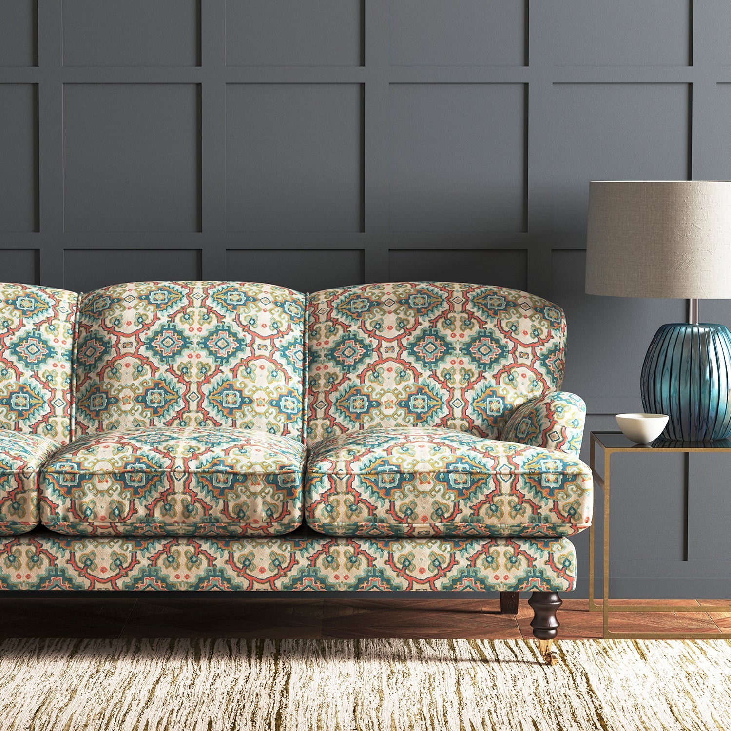 Velvet sofa upholstered in a printed velvet fabric with an oriental geometric design in blue colours