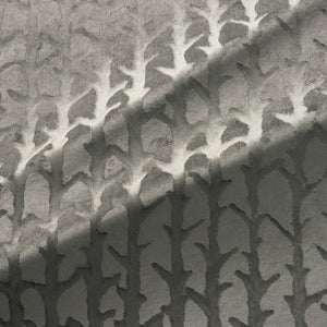 Fabric swatch of a dark neutral velvet fabric with abstract branch design, suitable for curtains and upholstery 