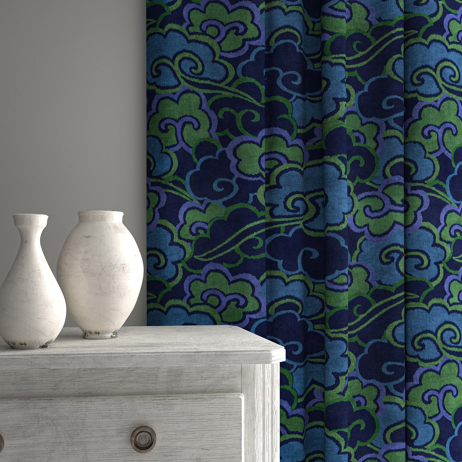 Velvet curtains upholstered in a printed velvet fabric with enchanting landscape of abstract clouds design in blue and green colours.