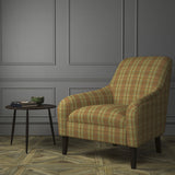 Chair upholstered in a luxury Scottish rust-toned wool tartan upholstery fabric