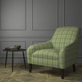 Chair upholstered in a luxury Scottish green wool tartan upholstery fabric