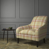 Chair upholstered in a beige and red Scottish wool plaid check fabric