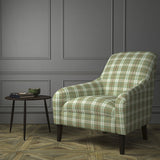Chair upholstered in a green Scottish wool plaid check fabric
