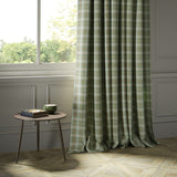 Curtains in a green Scottish wool plaid check fabric