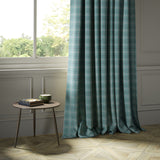 Curtains in a blue Scottish wool plaid check fabric