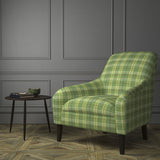 Chair upholstered in a green Scottish wool plaid check fabric
