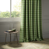 Curtains in a green Scottish wool plaid check fabric