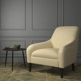 Chair upholstered in a cream Scottish wool windowpane check fabric