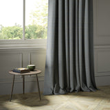 Curtains in a grey Scottish wool windowpane check fabric