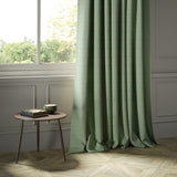 Curtains in a green Scottish wool windowpane check fabric