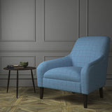 Chair upholstered in a blue Scottish wool windowpane check fabric