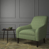 Chair upholstered in a green Scottish wool windowpane check fabric