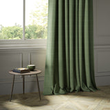 Curtains in a green Scottish wool windowpane check fabric