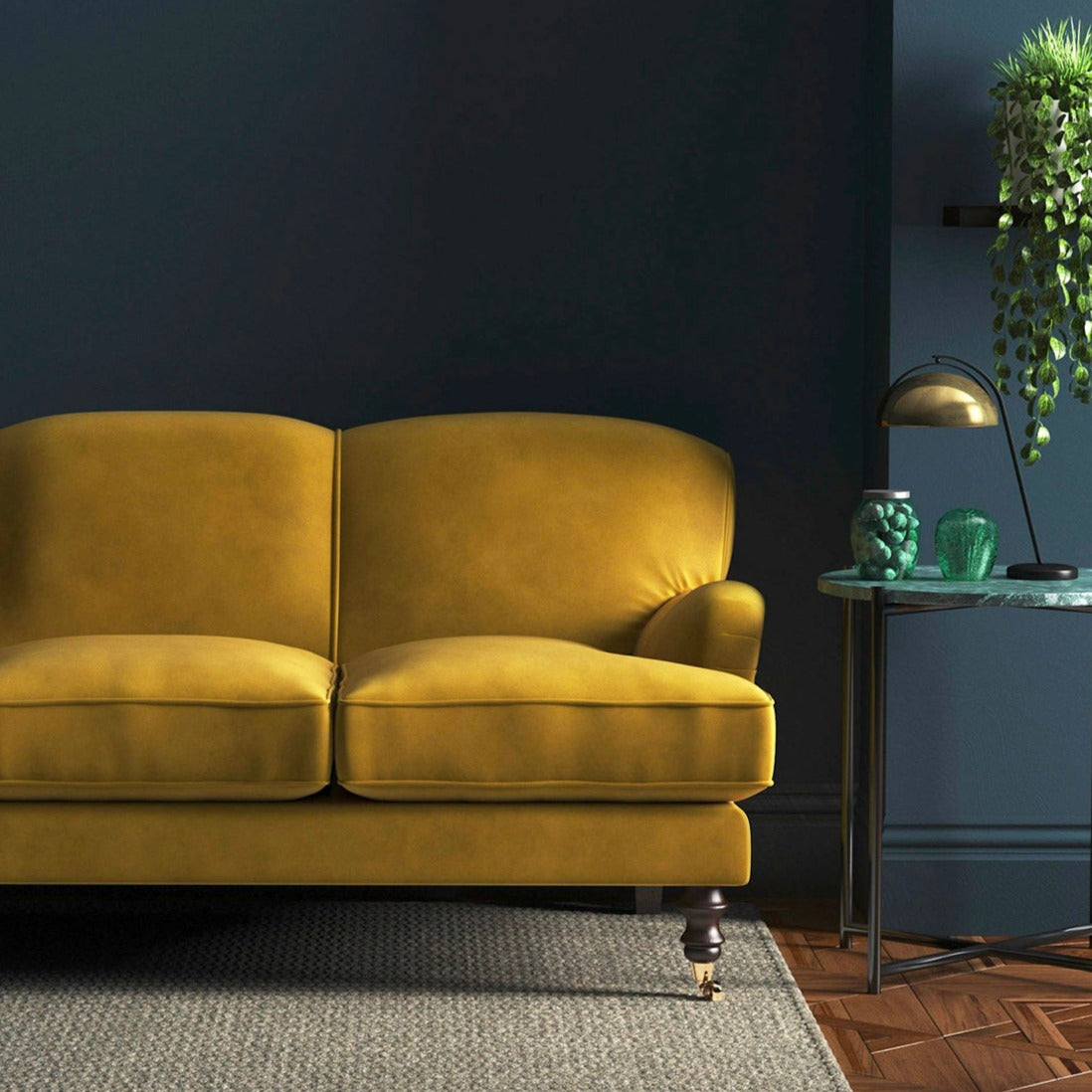 Sofa covered in a yellow velvet upholstery fabric
