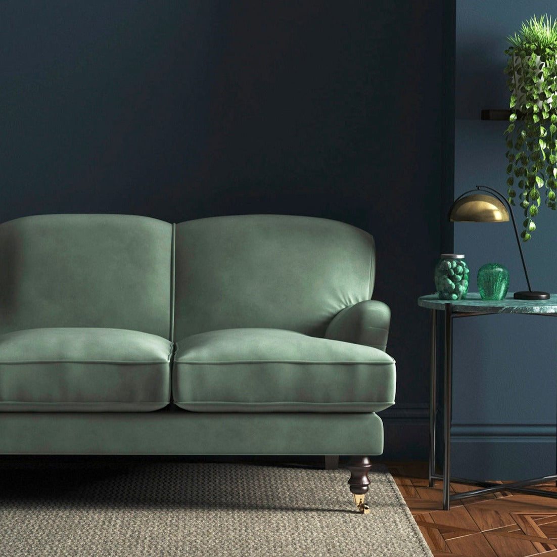 Sofa covered in a blue velvet upholstery fabric