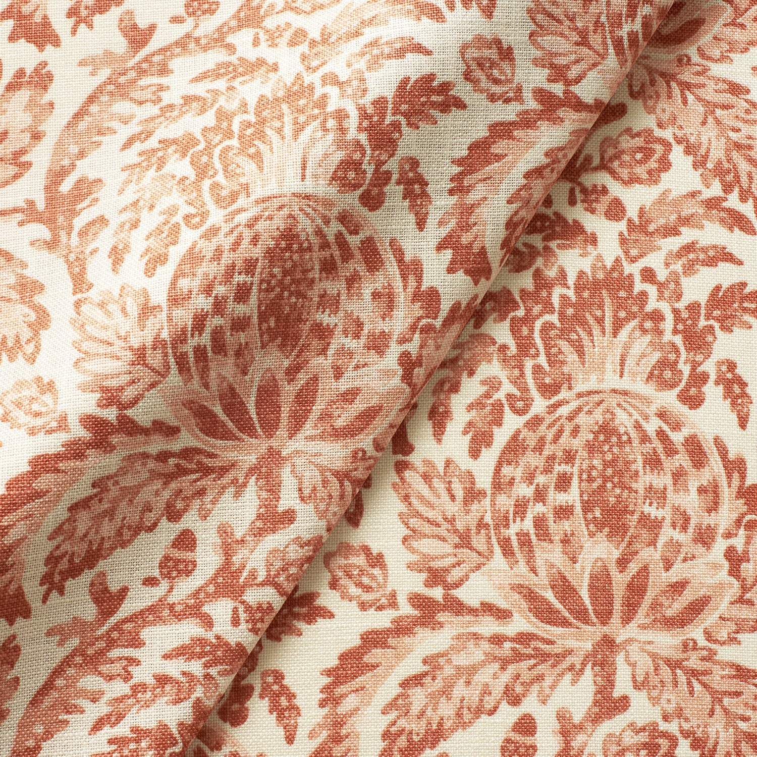 Fabric swatch of a light red vintage inspired floral and leaf design fabric for curtains and upholstery