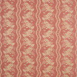 Fabric swatch of a red floral fabric with striped design for curtains and upholstery