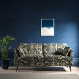 Sofa with a navy blue fabric with stylised floral design