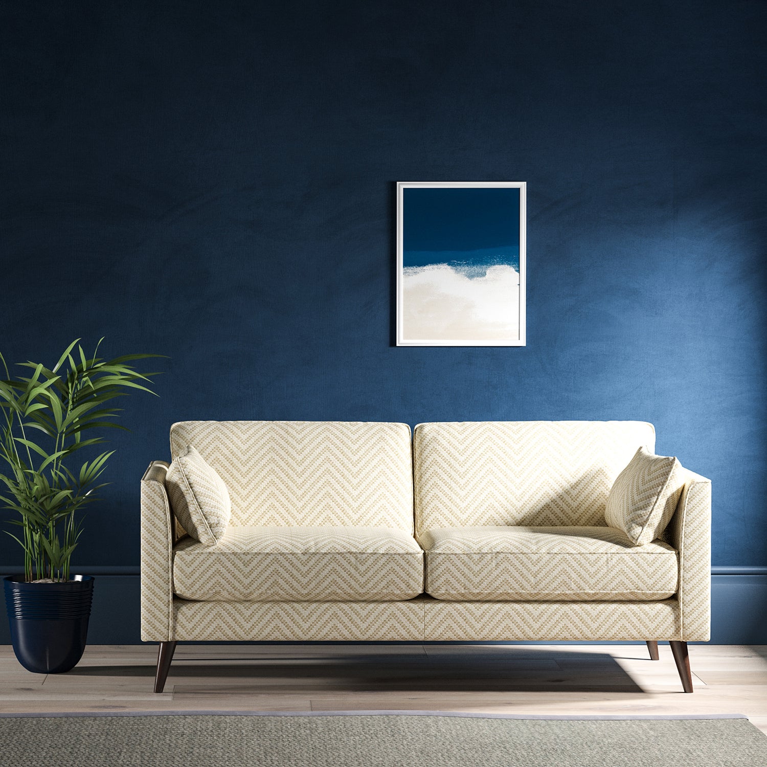 Sofa upholstered in a neutral herringbone upholstery fabric