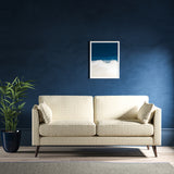 Sofa upholstered in a neutral herringbone upholstery fabric