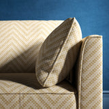 Sofa upholstered in a neutral herringbone upholstery fabric